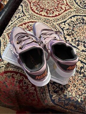 Nike Women's Lavender Mesh Athletic Sneakers with Peach Accents